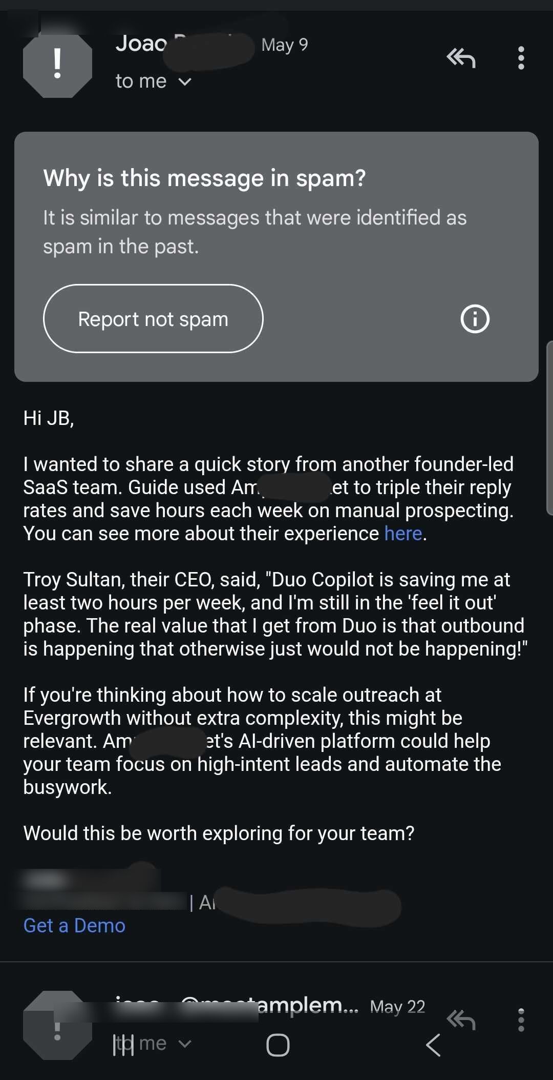 Cold email from Amplemarket pitching Duo Copilot, with Gmail showing a Why is this message in spam banner because Gmail flagged it as similar to known spam patterns